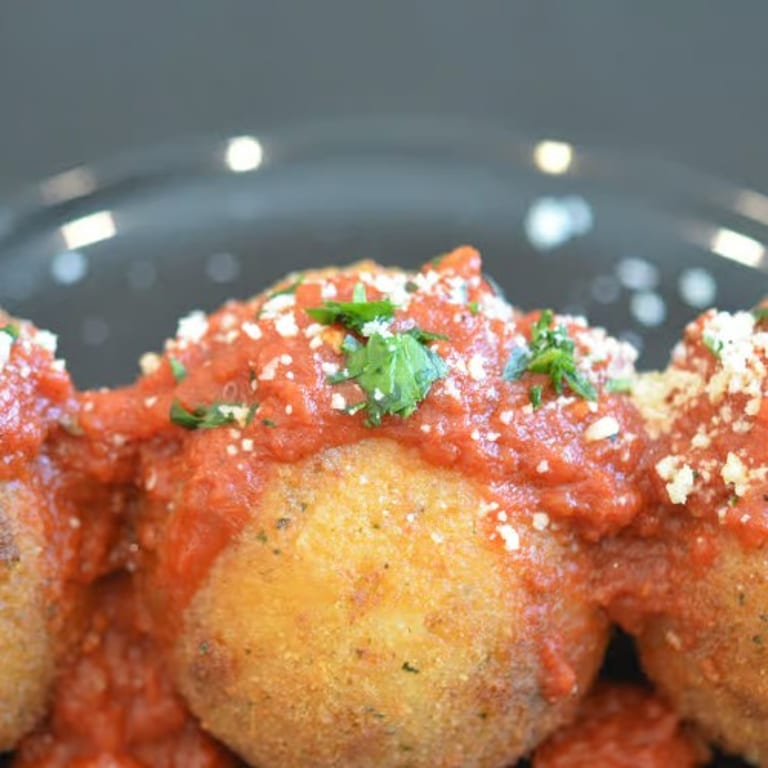 Savor our arancini rice balls